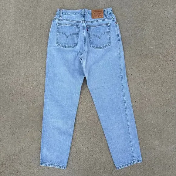 Vintage 90s Levi's 550 Relaxed Fit Tapered Leg Light Blue Jeans Size 12 Reg M